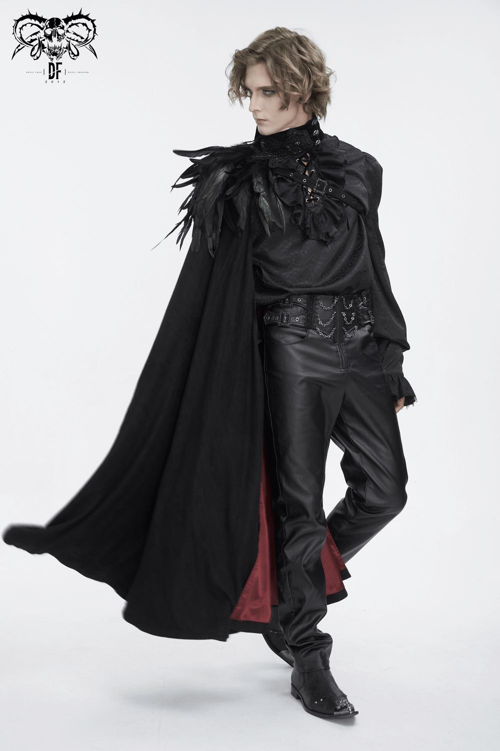 Chic black asymmetric cape with feather accents, perfect for evening glam and stylish entrances.