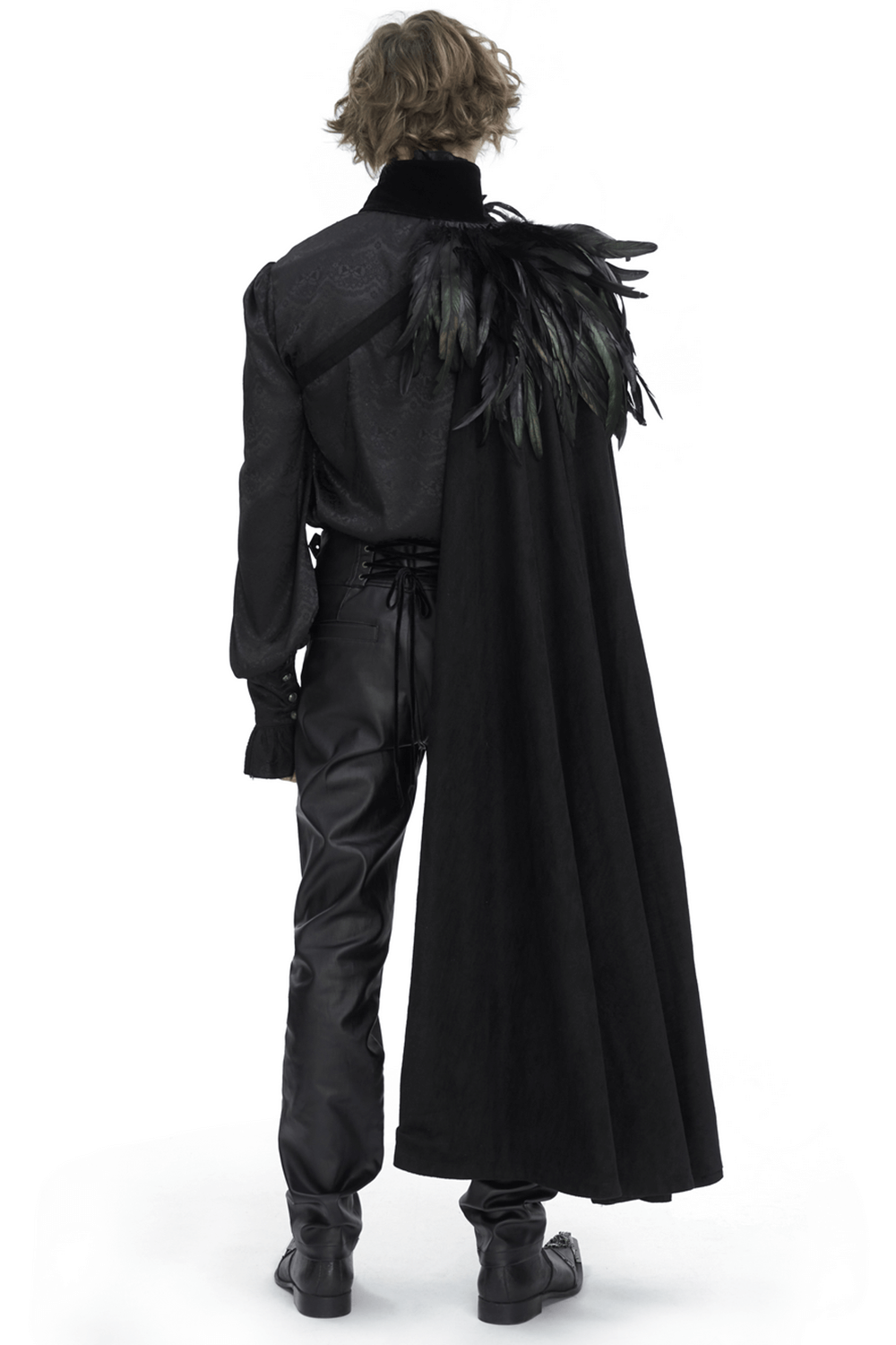 Back view of a chic black asymmetric cape with feather accents, worn with stylish black outfit for evening events.