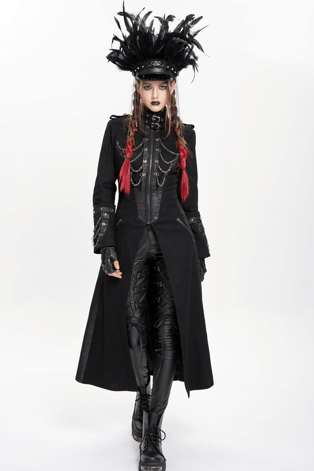 Gothic model in a black feathered leather cap and long coat, showcasing punk-inspired style.