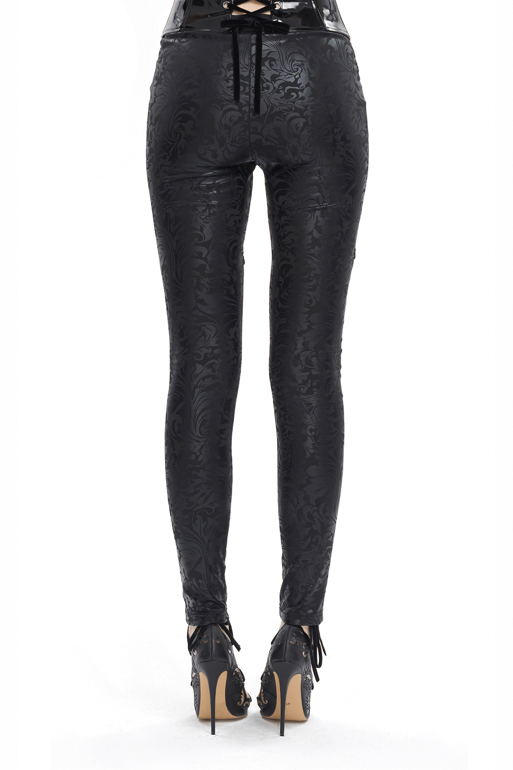Female black embroidered leggings with intricate designs, perfect for gothic-inspired fashion and alternative style.