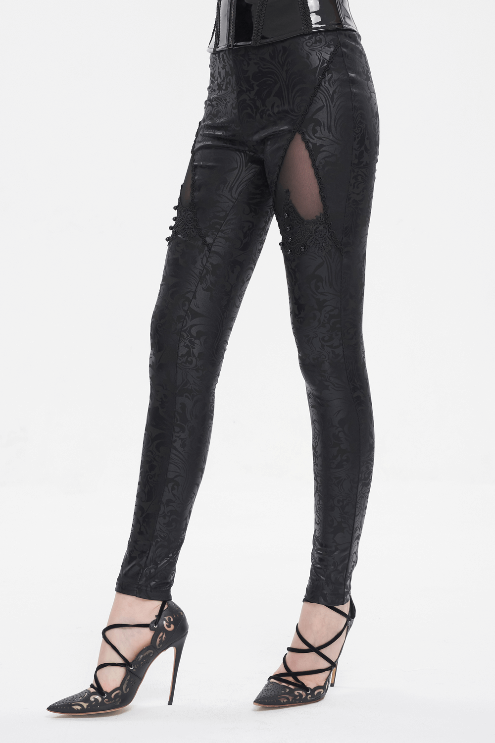 Female Black Embroidered Splice Leggings / Gothic Decorated Beads Pants showcased with stylish heels.