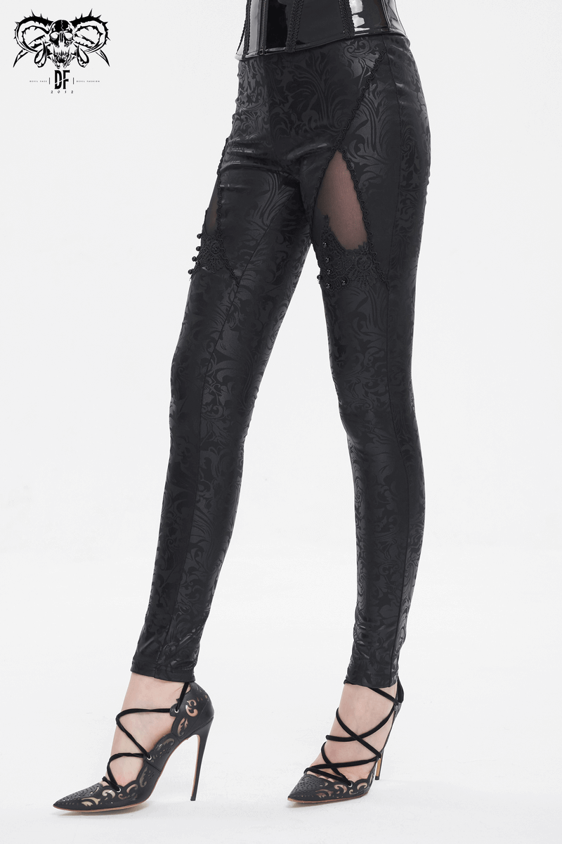Gothic black embroidered leggings with splice design, stylishly paired with strappy heels.
