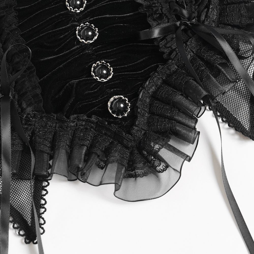 Female Black Lace Crop Top with Ruffle Trim Detail featuring ruffle trim, lace-up side accents, and jewel-button details.