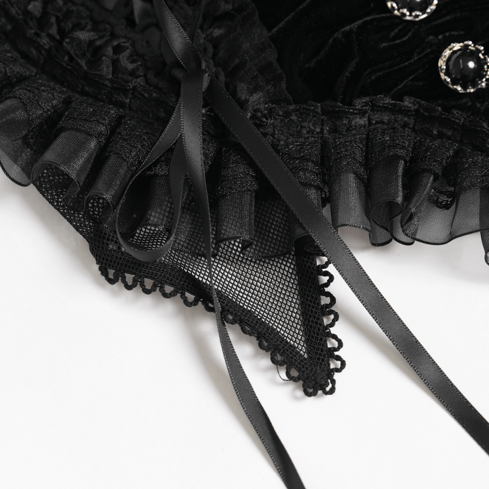 Female Black Lace Crop Top with Ruffle Trim Detail highlighting intricate lace, ruffles, and decorative buttons.