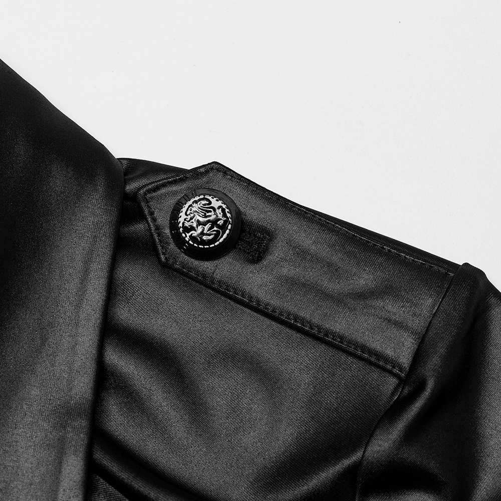 Close-up of shoulder detail on a black zip-up punk style shirt with decorative button.