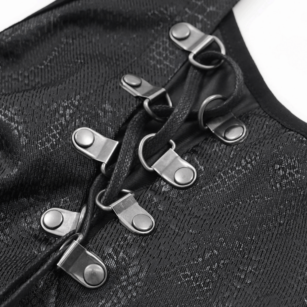 Close-up of adjustable straps and metallic accents on a black punk crop top, showcasing its edgy and unique design.