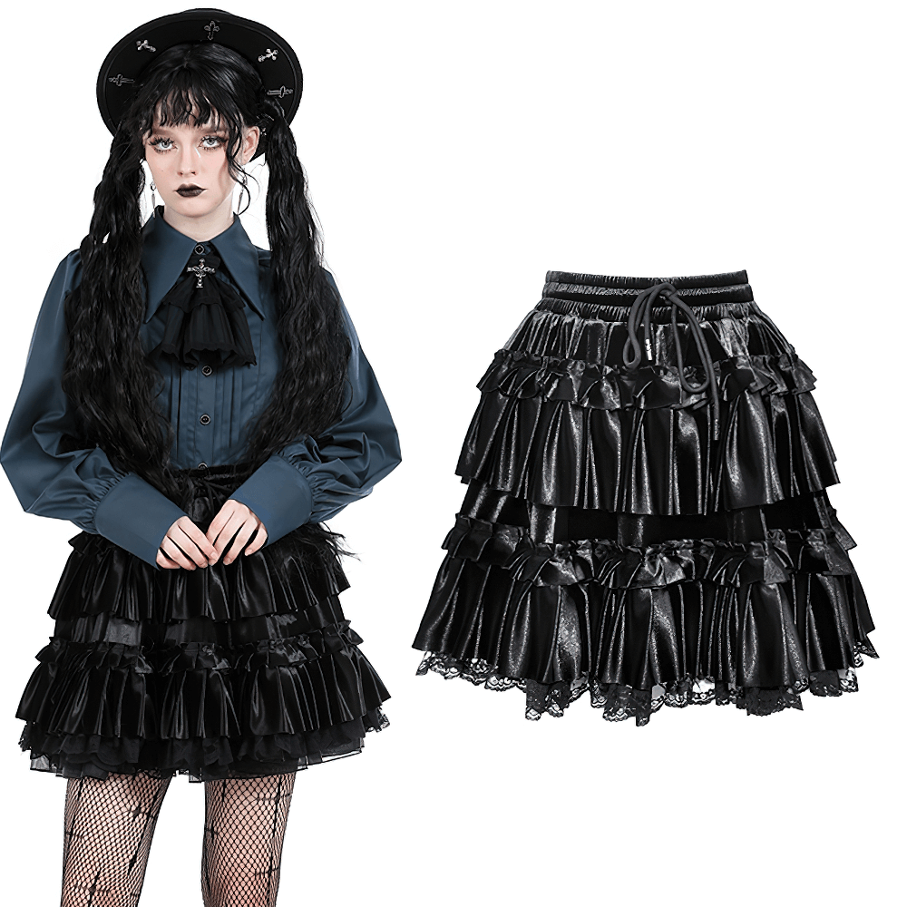 Stylish female model wearing a black frilly layered mini skirt with lace trim, exuding elegance and sophistication.