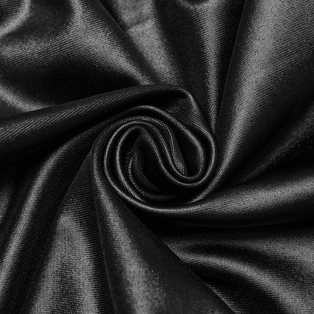 Close-up of glossy black fabric with a smooth texture, perfect for gothic-inspired fashion like leggings.