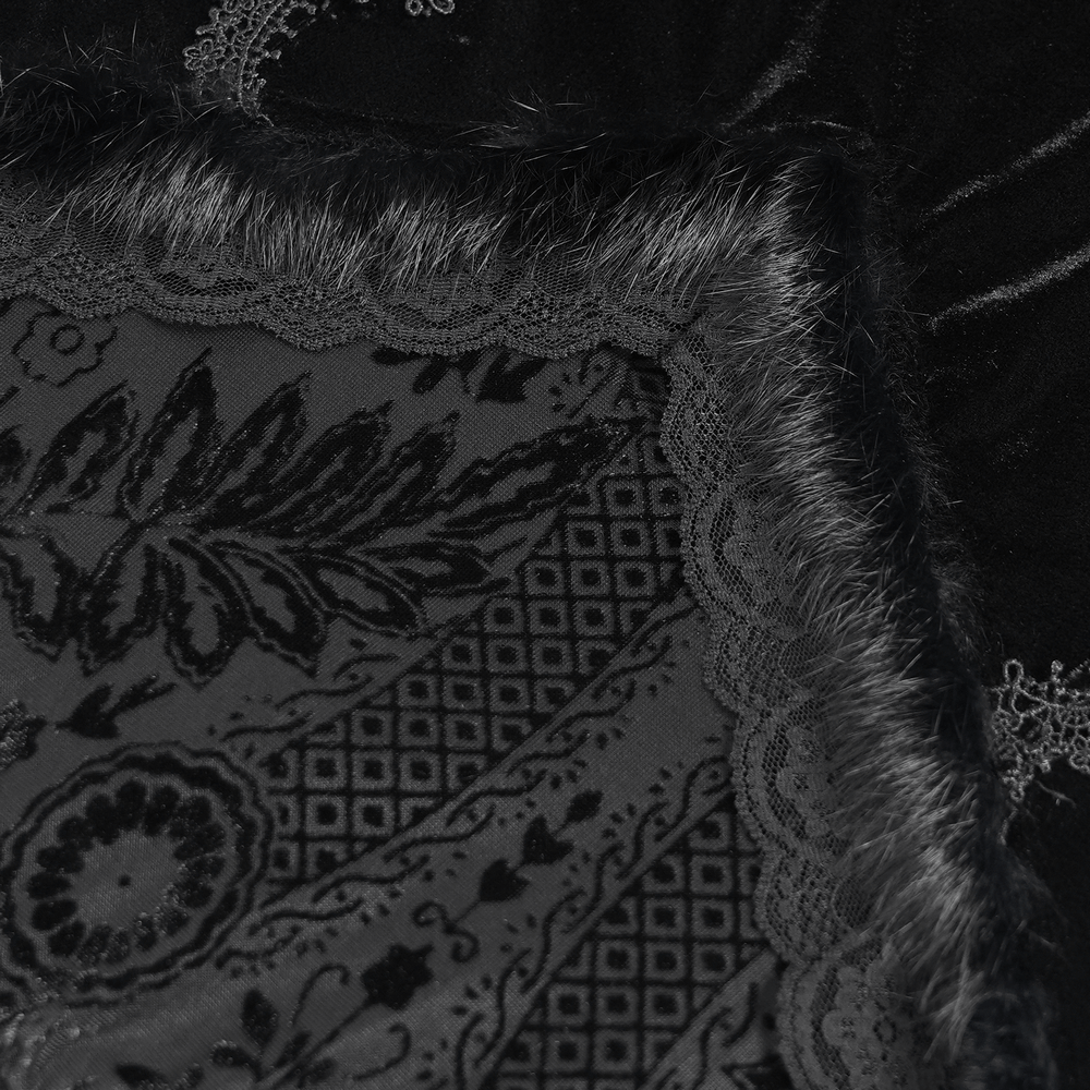 Close-up of black velvet fabric with elegant lace trim, featuring intricate gothic patterns and a soft fur-like edge.