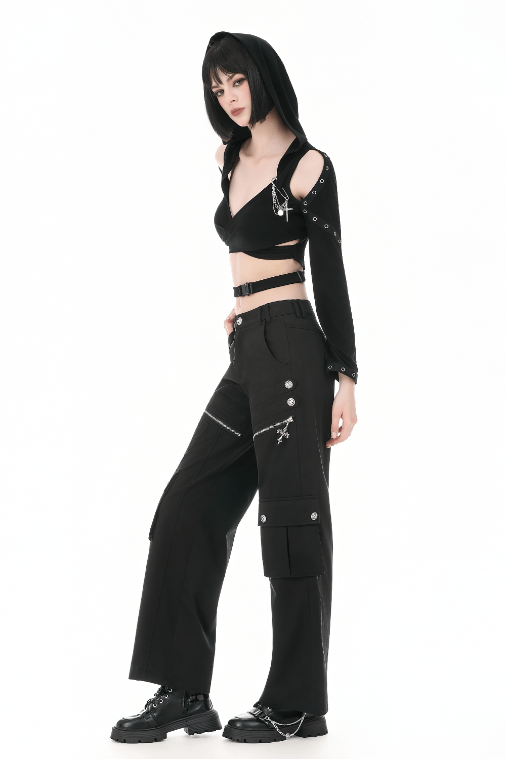 Female Gothic Hooded Crop Top with Chain and Buckle Detail worn with black cargo pants and platform boots.