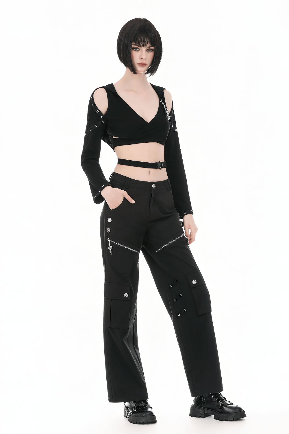 Female Gothic Hooded Crop Top with Chain and Buckle Detail worn with stylish black pants and edgy shoes.