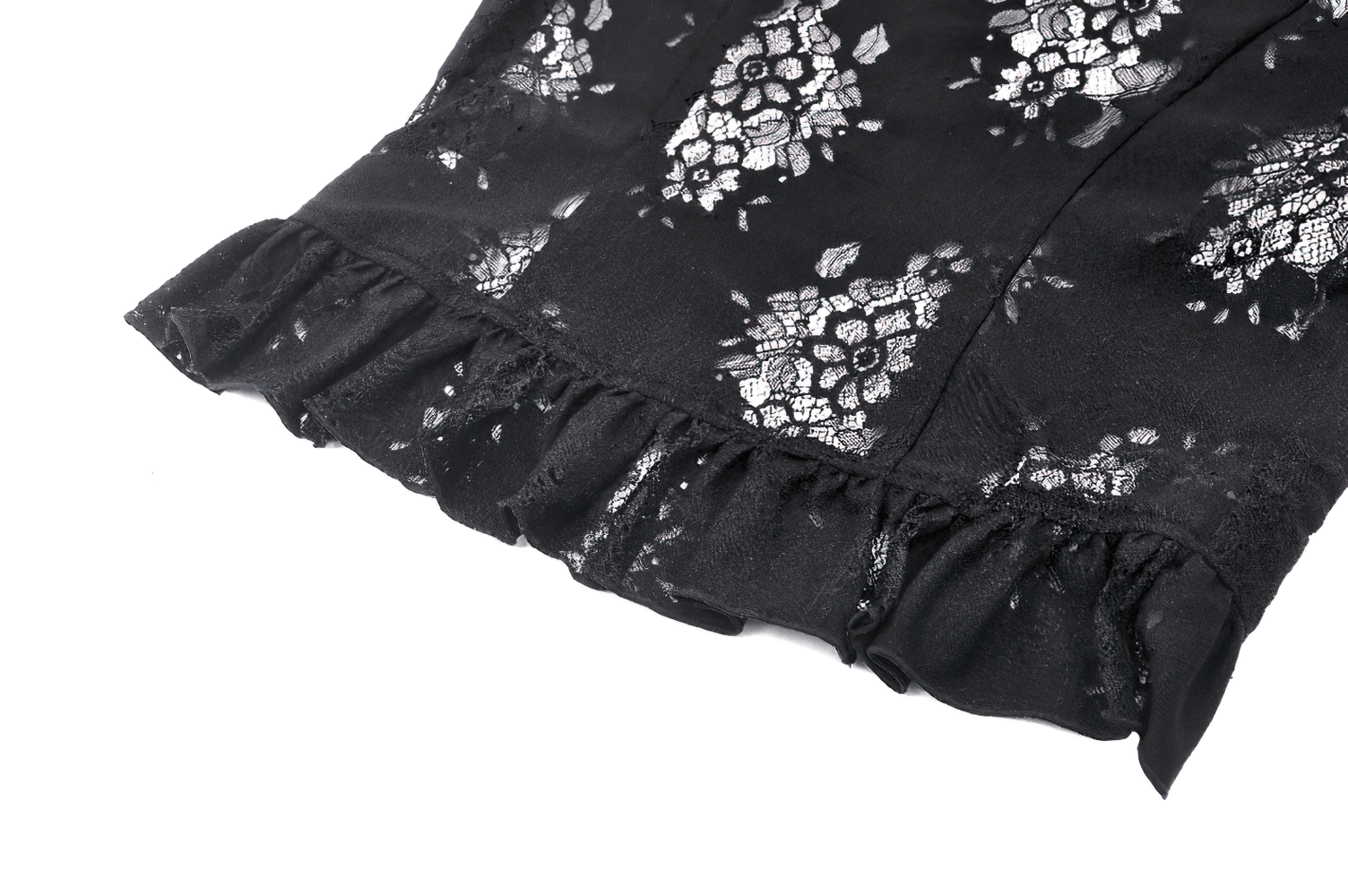 Black lace fabric detail featuring a ruffled hem and floral pattern, perfect for gothic style blouses.