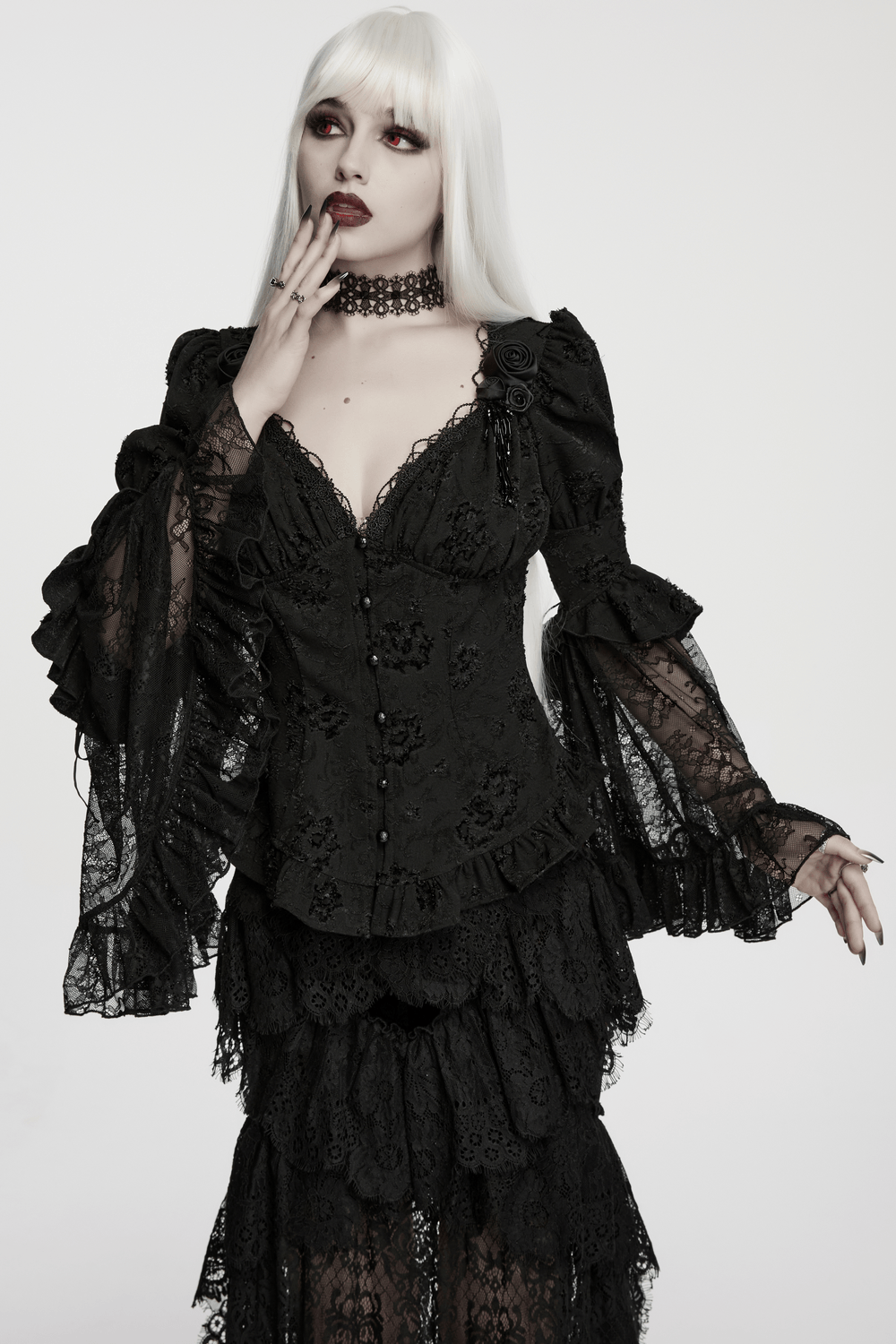 Female Gothic Lace Choker with Black Spike Stud accenting a dark romantic outfit with detailed lace design.