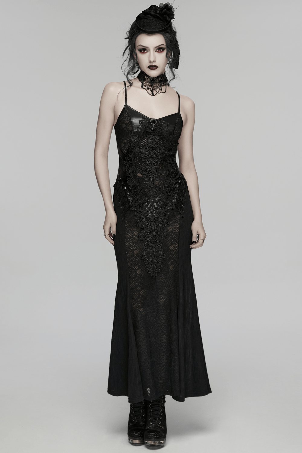 Female Gothic Lace Mesh Slip Dress with Lace Up Back worn by a model, showcasing dark allure and intricate lace details.