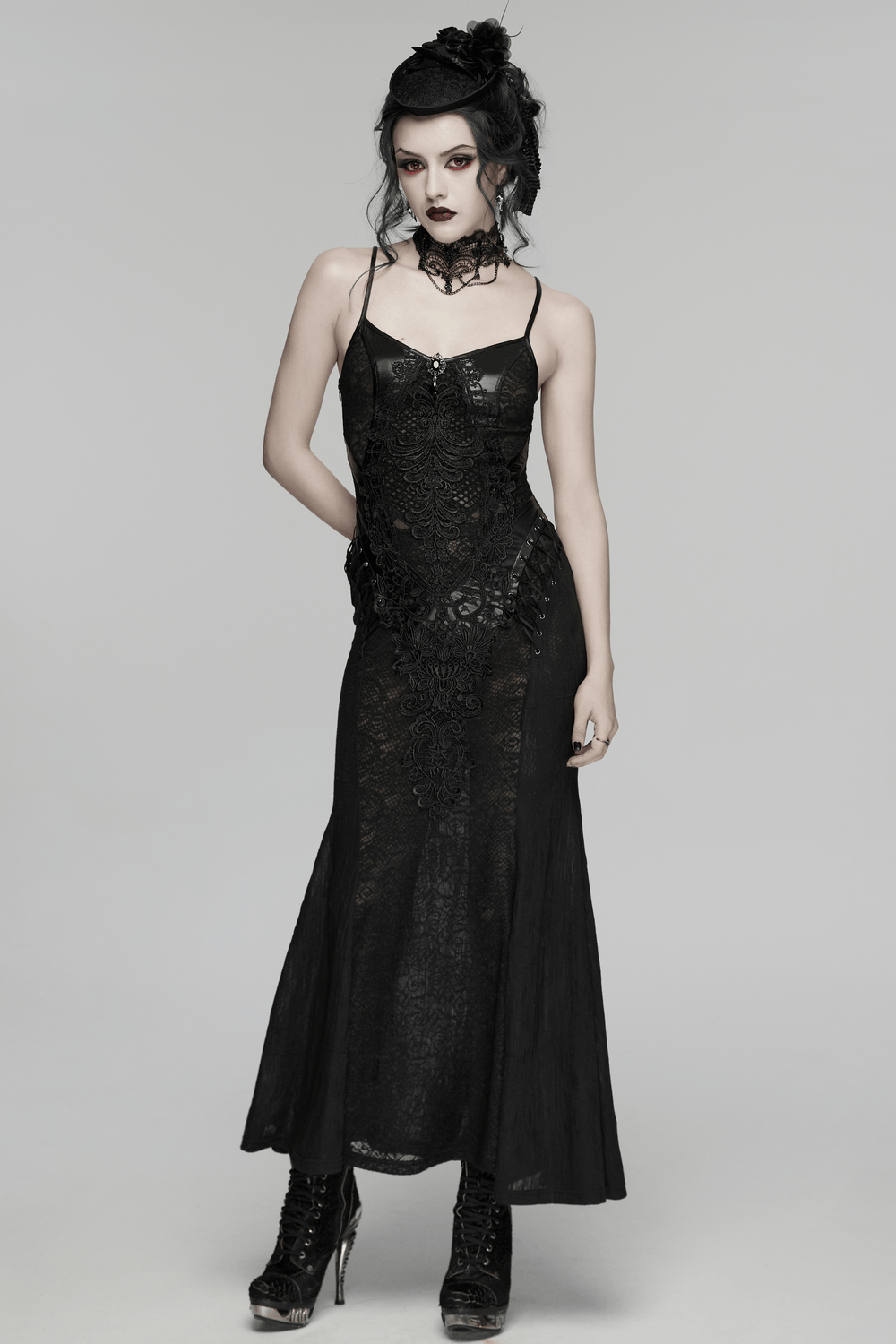 Female Gothic Lace Mesh Slip Dress with Lace Up Back showcased by a model in a striking black gown.