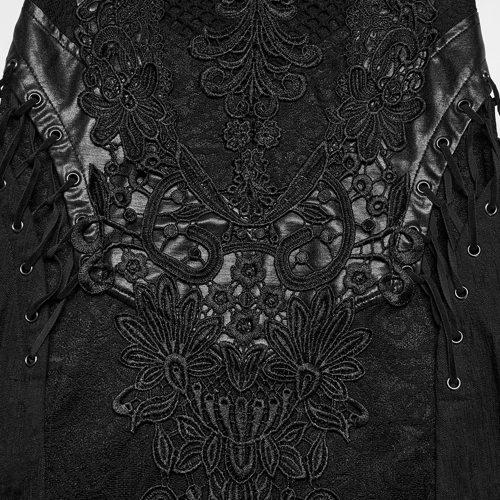 Female Gothic Lace Mesh Slip Dress with Lace Up Back featuring intricate lace detailing and textured panels.