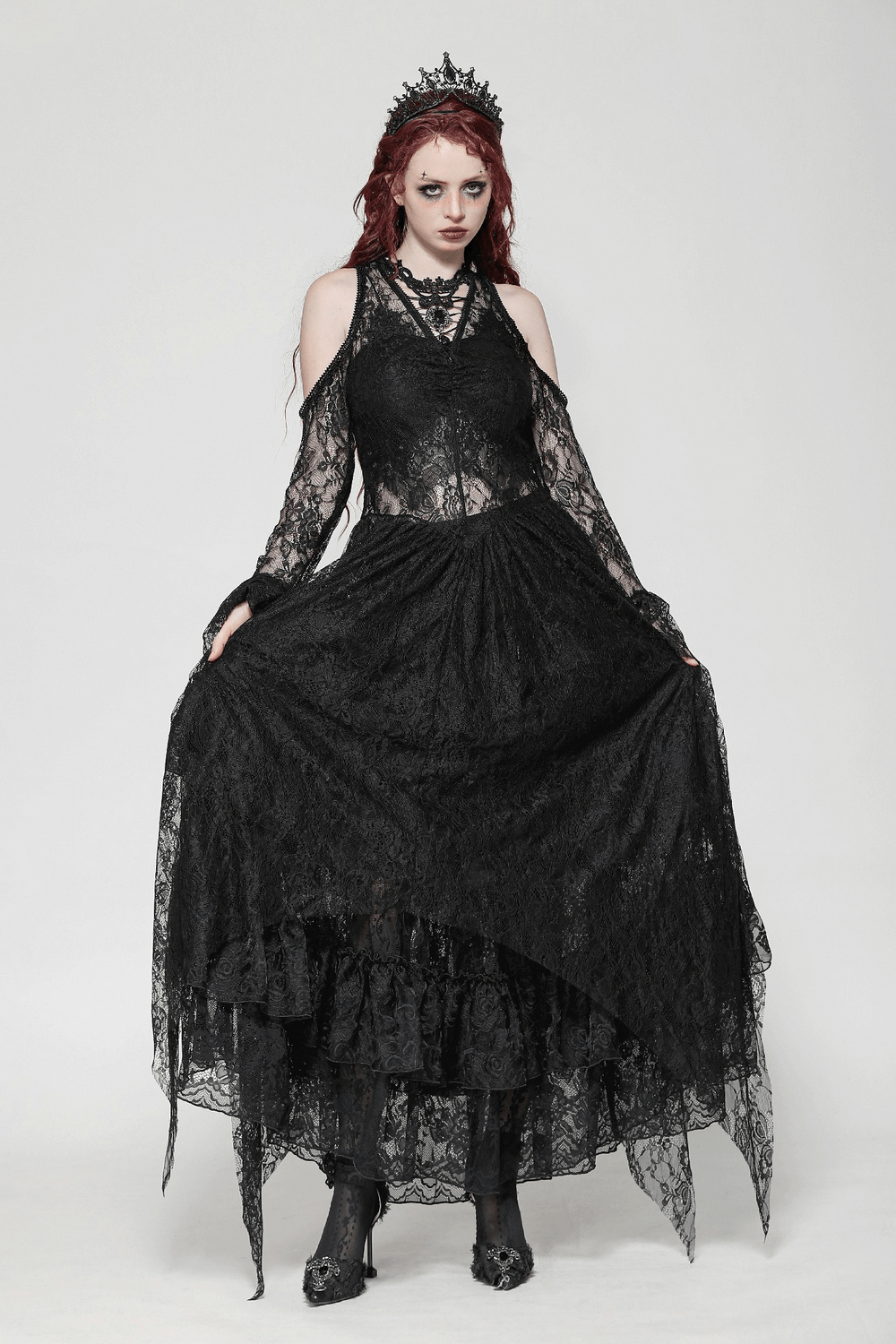 Female model in black Gothic lace overlay maxi dress with sleeves, showcasing elegant Victorian style.