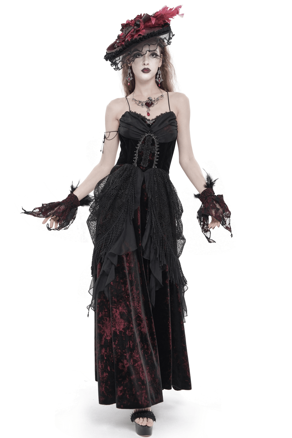 Female Gothic Lace-Up Dress with Ruffled Tulle Layers showcasing a vintage black velvet design and dramatic fringed details.