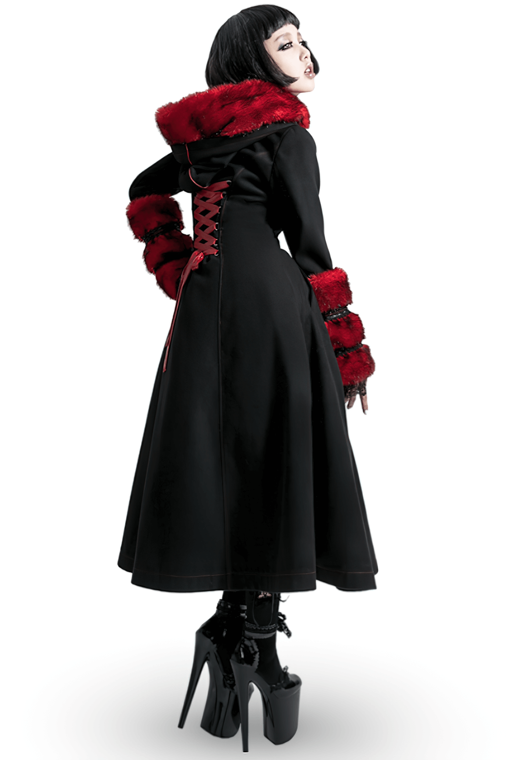 Elegant female in a gothic long coat with red faux fur trim and lace-up back, showcasing a dramatic style.
