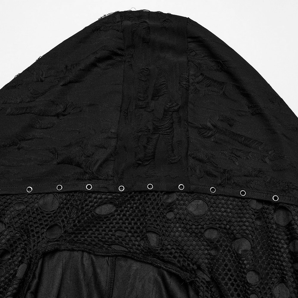 Close-up of a gothic hood with mesh detailing and eyelets from a knitted asymmetric coat.