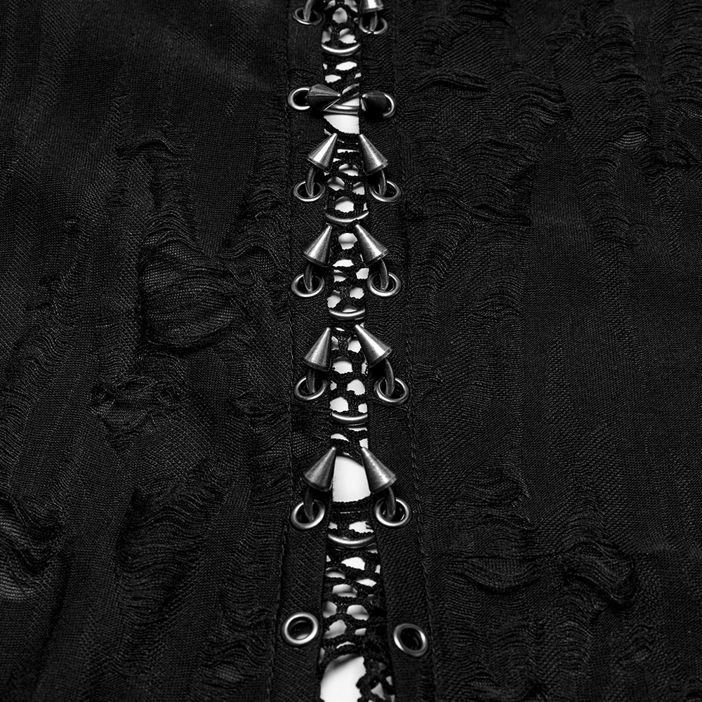 Close-up of black Gothic coat detailing with eyelets and spiked rings for an edgy look.