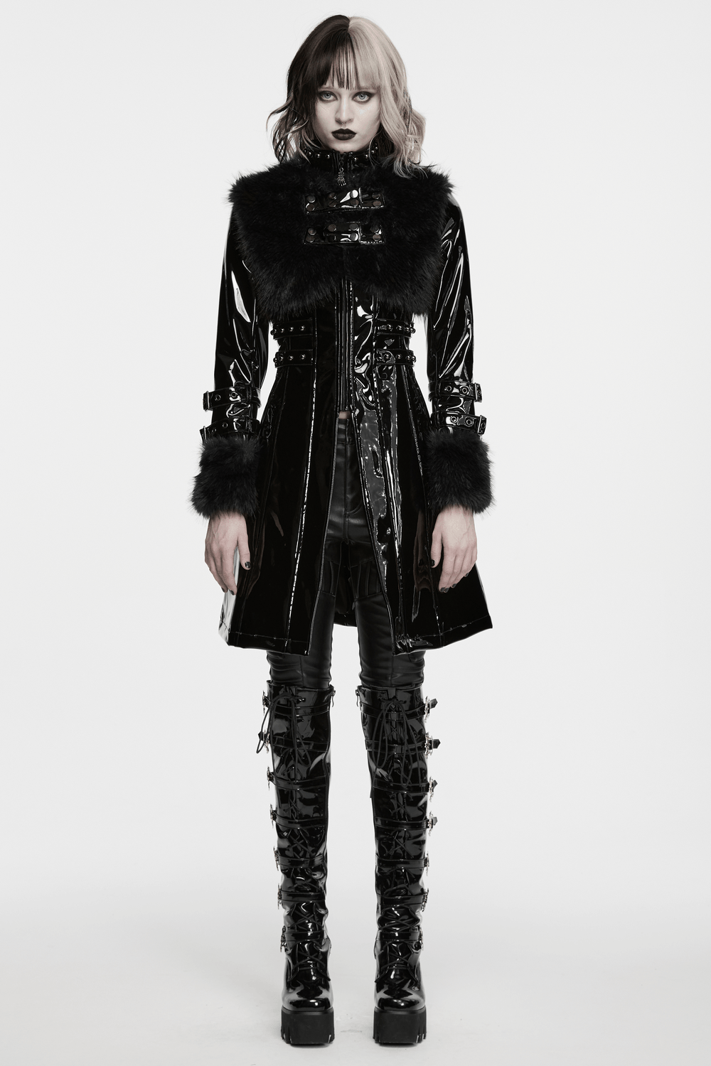 Female Gothic Patent Leather Coat with Faux Fur Trim on a model showcasing punk style with bondage straps and long A-line silhouette.