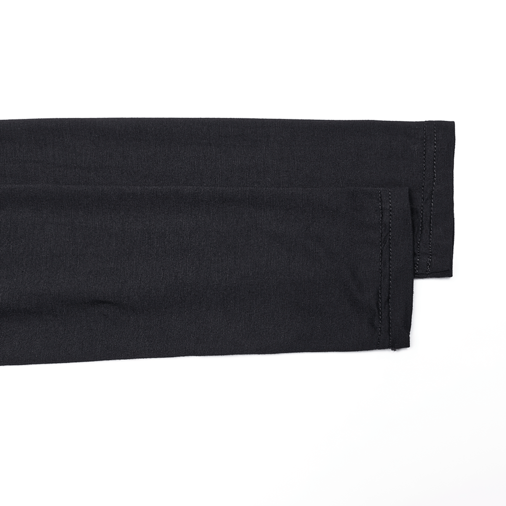 Black long sleeves of a gothic top, showcasing sleek fabric and perfect for a punk-inspired outfit.