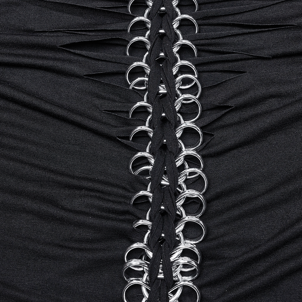 Close-up of gothic black long-sleeved top featuring silver chain detail and a striking skeleton print design.