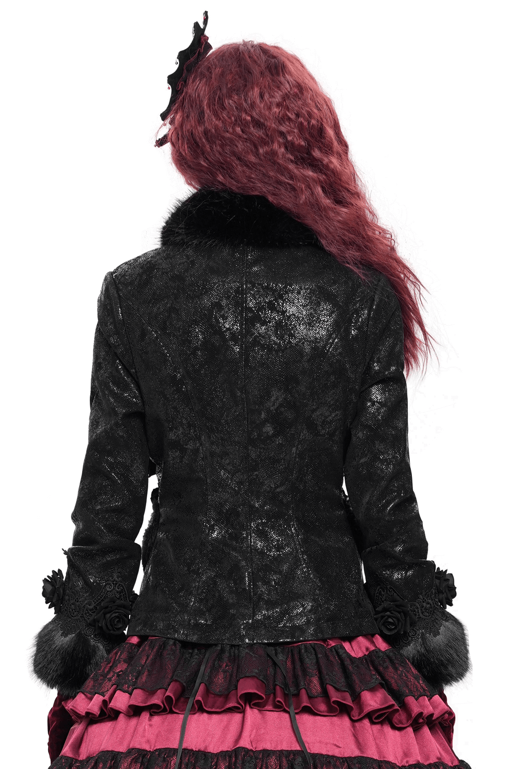 Back view of a gothic black jacket with faux fur trim, paired with a ruffled pink skirt, showcasing elegant lace roses.