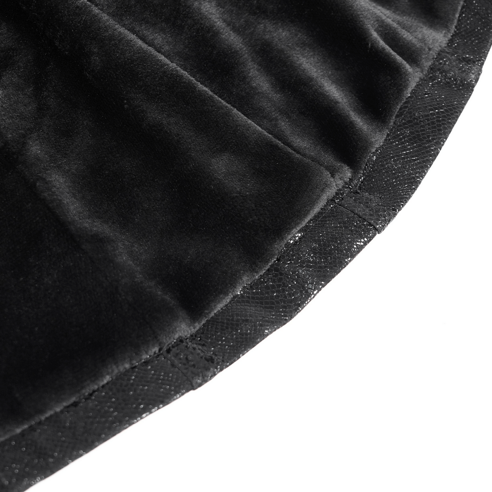 Close-up of soft black faux fur trim from a stylish women's jacket with intricate detailing.