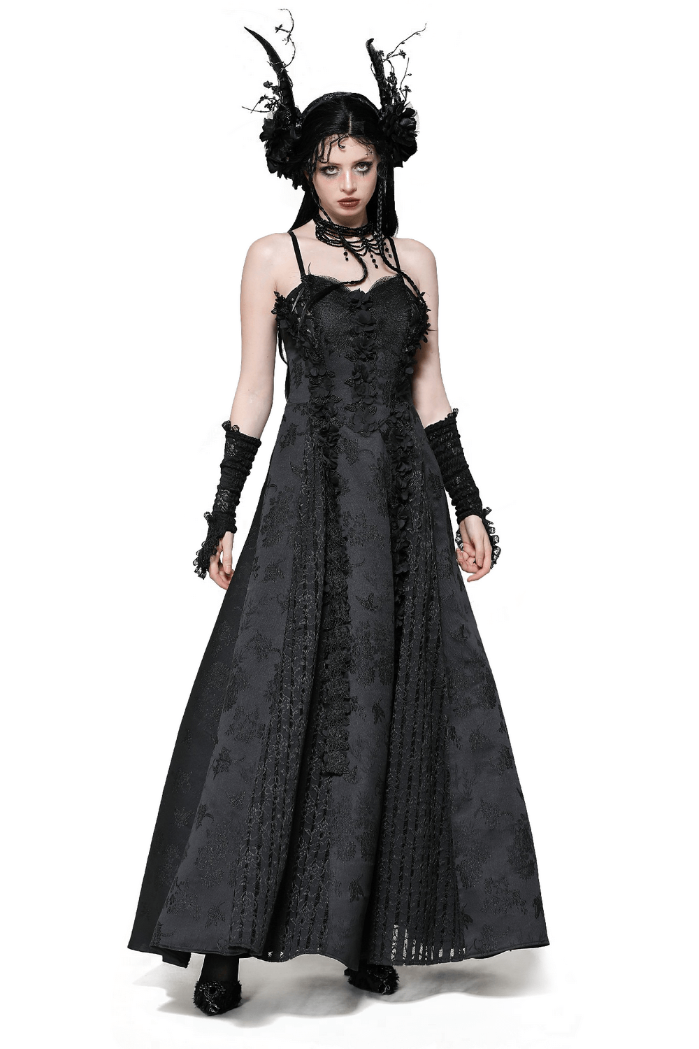 Elegant female model wearing a black lace gothic maxi dress with floral embroidery and intricate detailing. Perfect for Victorian-inspired occasions.