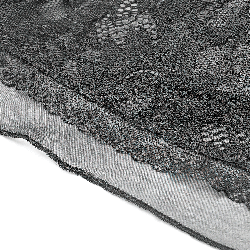 Close-up of delicate lace trim on gothic shorts with swallow tail design, perfect for a bold yet feminine look.