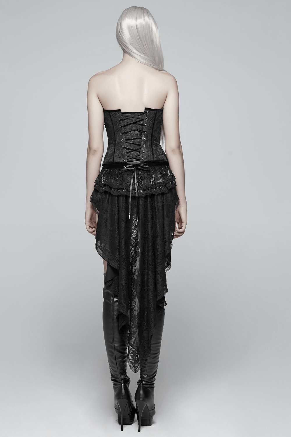 Back view of a woman in a black lace-trimmed gothic corset with swallow tail detail, showcasing elegance and style.