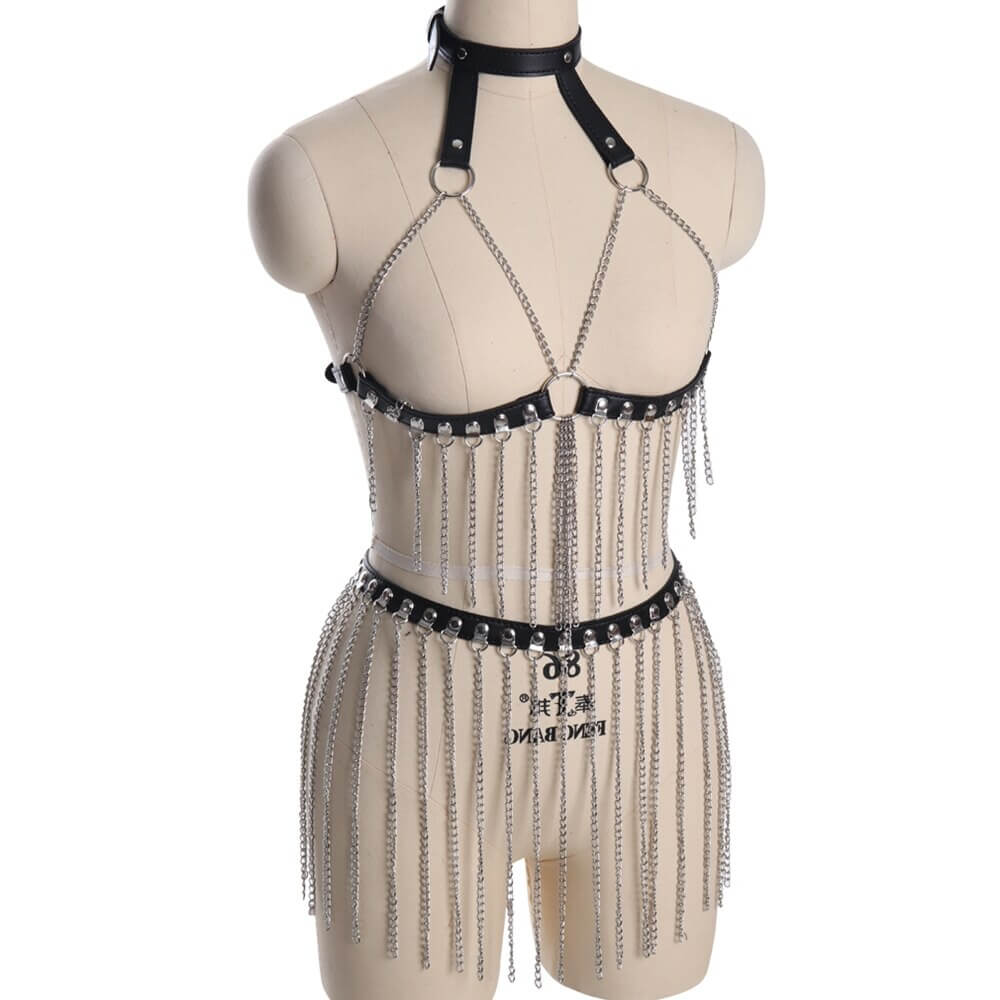 Female leather body harness with hanging chains, gothic fashion accessory on mannequin, perfect for festival style and daring elegance