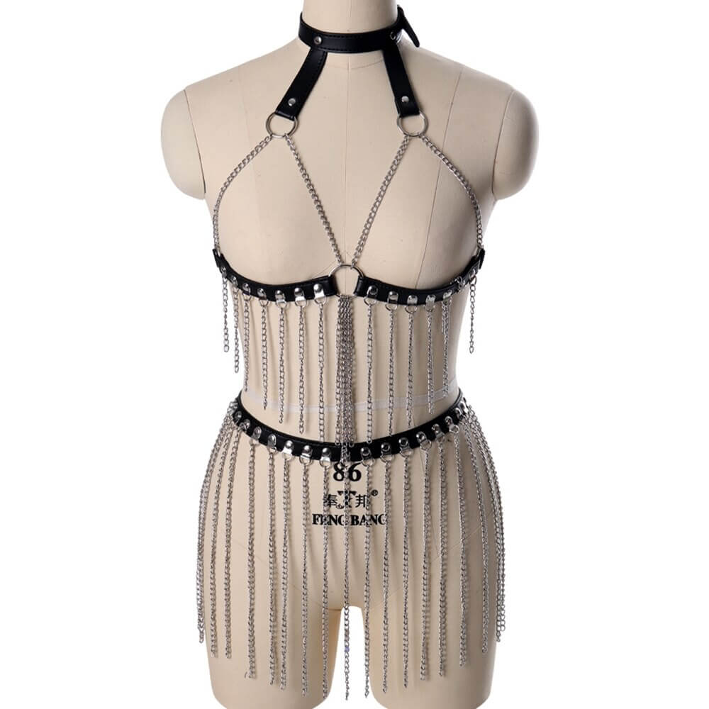 Gothic leather body harness with hanging chains on mannequin, perfect for festival fashion and alternative style.