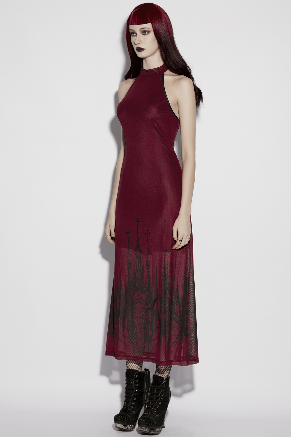 Female Mesh Gothic Halter Maxi Dress with Church Print showcased on a model with dramatic church print and lace-up back detail.