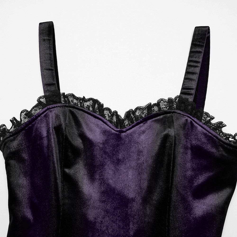 Close-up of a female sleeveless velvet dress with lace trim and ruffle hem in rich purple.