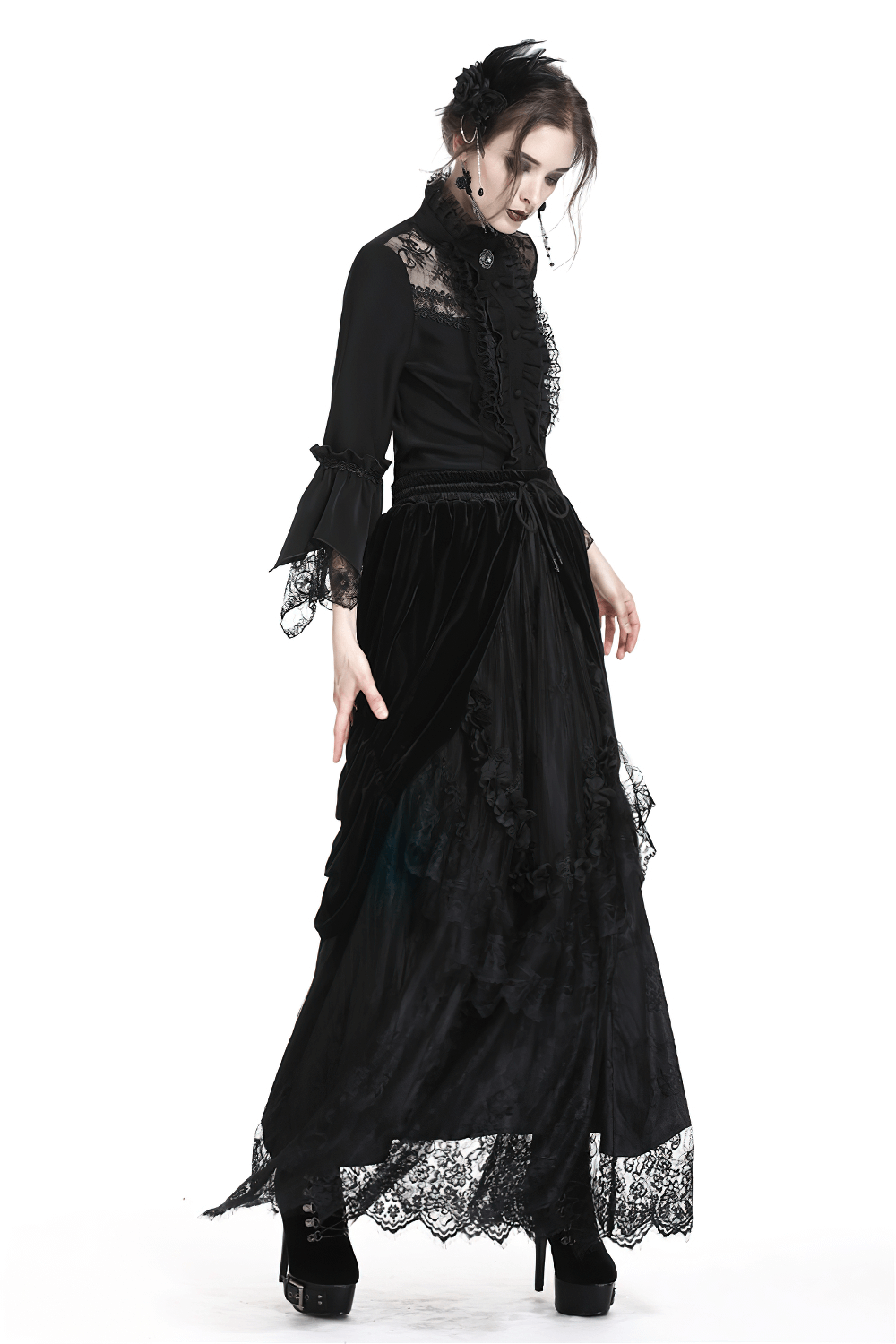 Flowy black velvet gothic maxi skirt with lace trim, perfect for a dark romantic style.