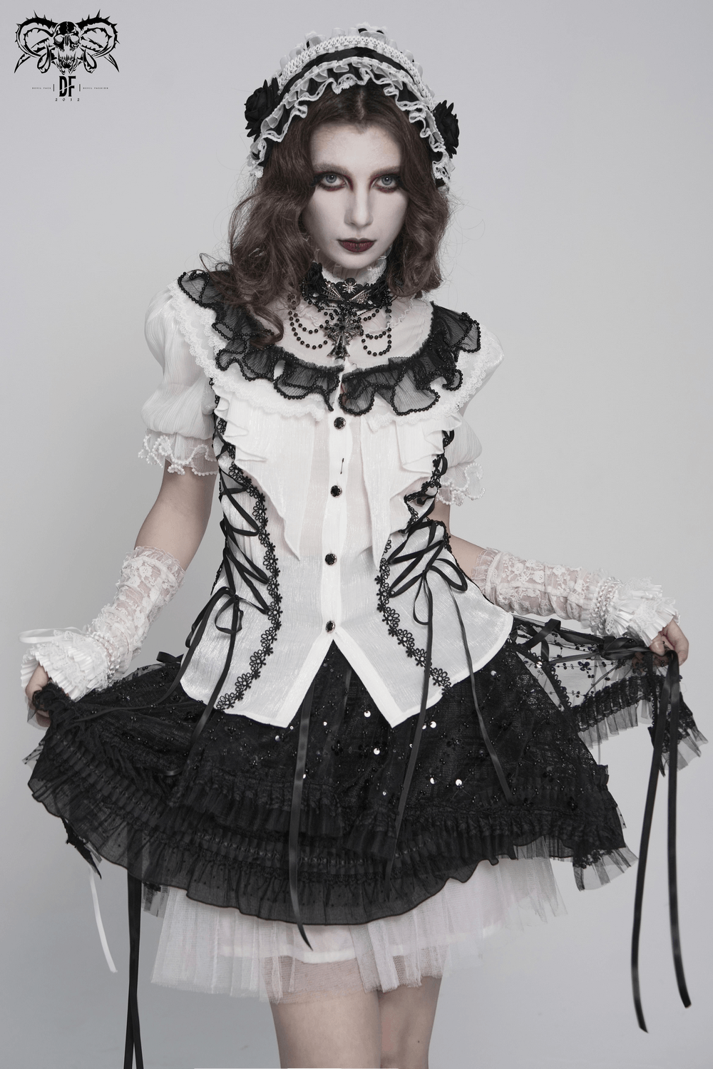 Female Victorian Blouse with Black Lace-Up Corset Back worn by model in gothic style outfit, showcasing ruffle details.