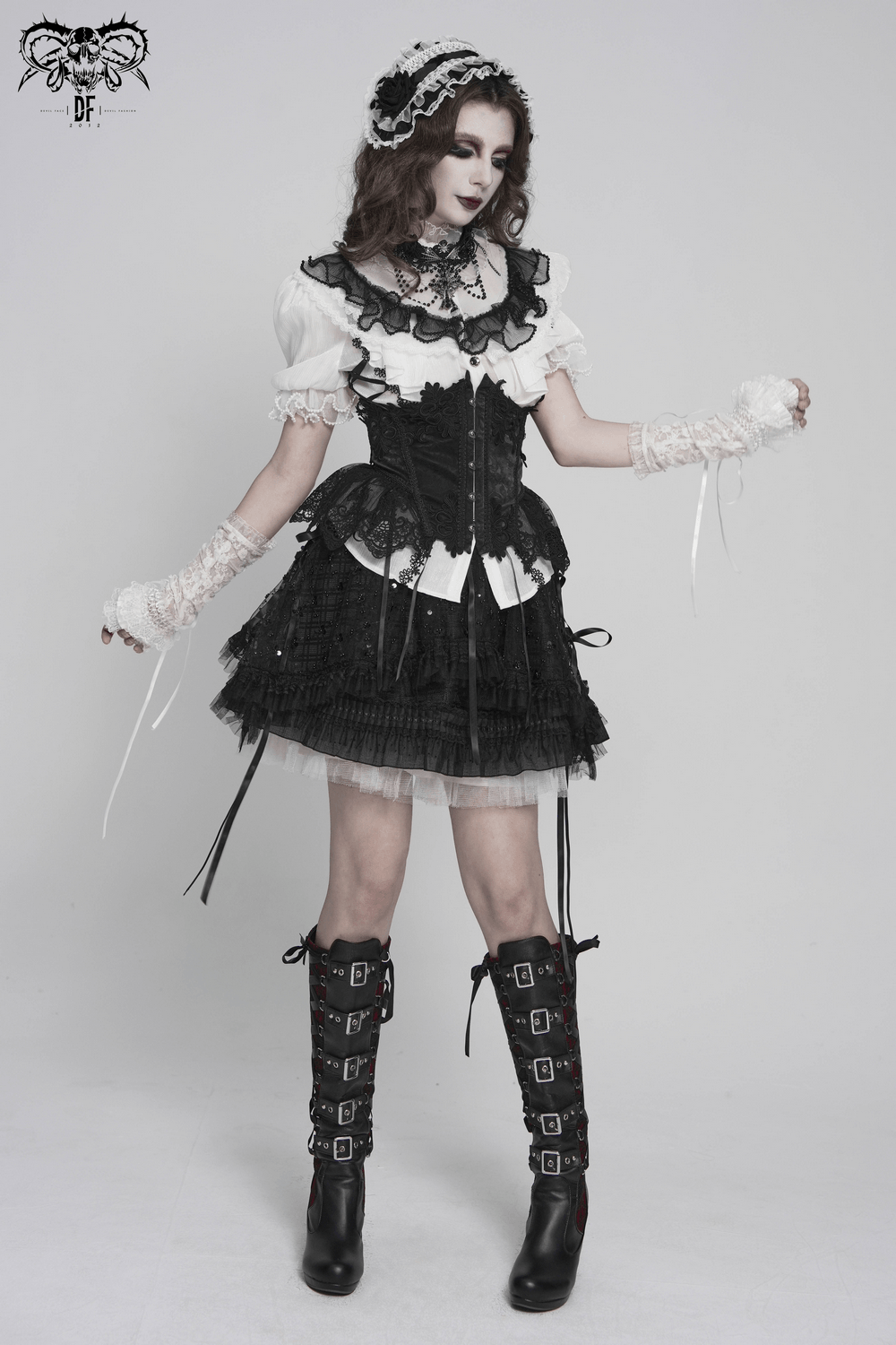 Female Victorian Blouse with Black Lace-Up Corset Back worn with gothic skirt and accessories.