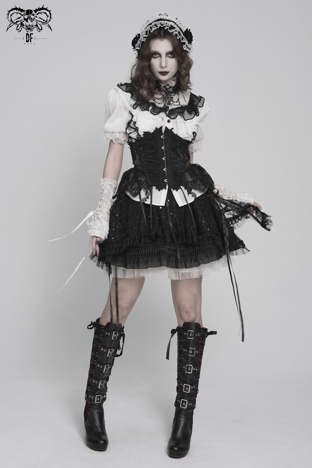 Female Victorian Blouse with Black Lace-Up Corset Back worn by model in gothic attire with dramatic makeup.