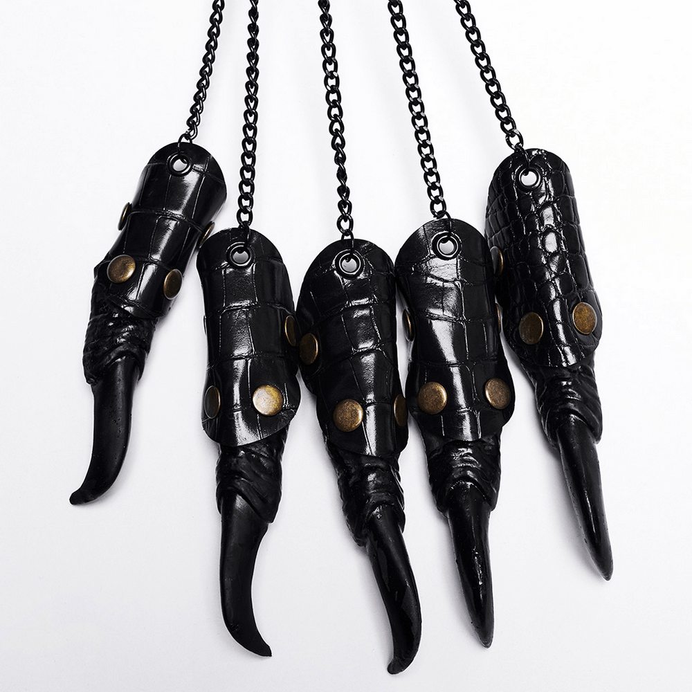 Fierce punk claw gloves in black faux leather with chains and spikes, perfect for a rockstar look.