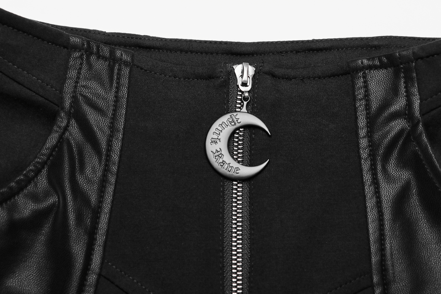 Close-up of the zipper detail on high waist flare pants with a crescent pendant, showcasing edgy punk style.