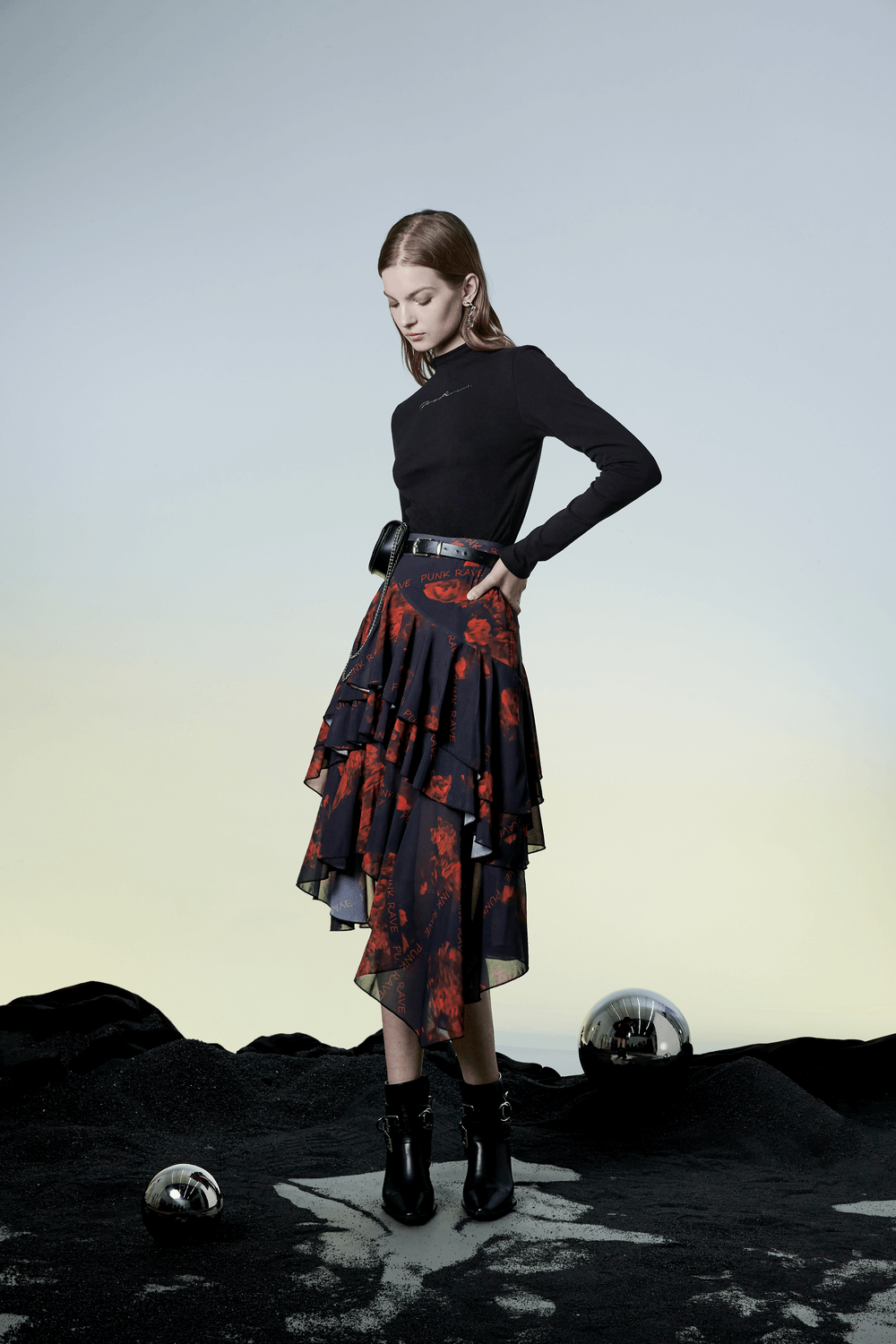 Flowy Punk Rave high-low floral layered skirt, featuring an asymmetric hem and stylish black top.