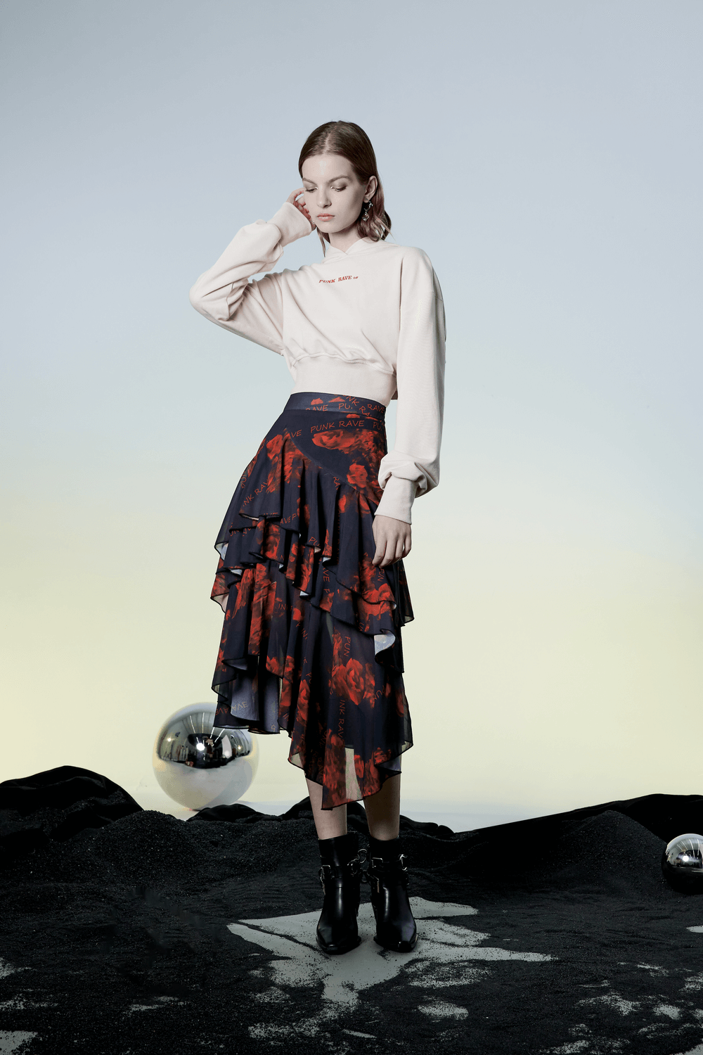 Punk Rave high-low layered floral skirt with a chic model, showcasing a dark rose pattern and stylish A-line silhouette.