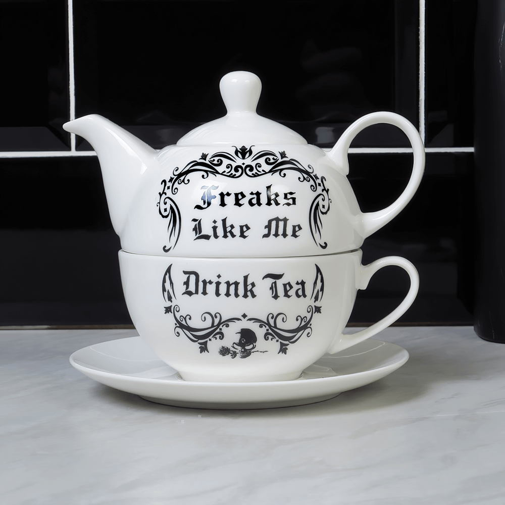 Freaks Like Me Tea For One Set featuring gothic teapot and cup on a saucer, perfect for unique tea moments.