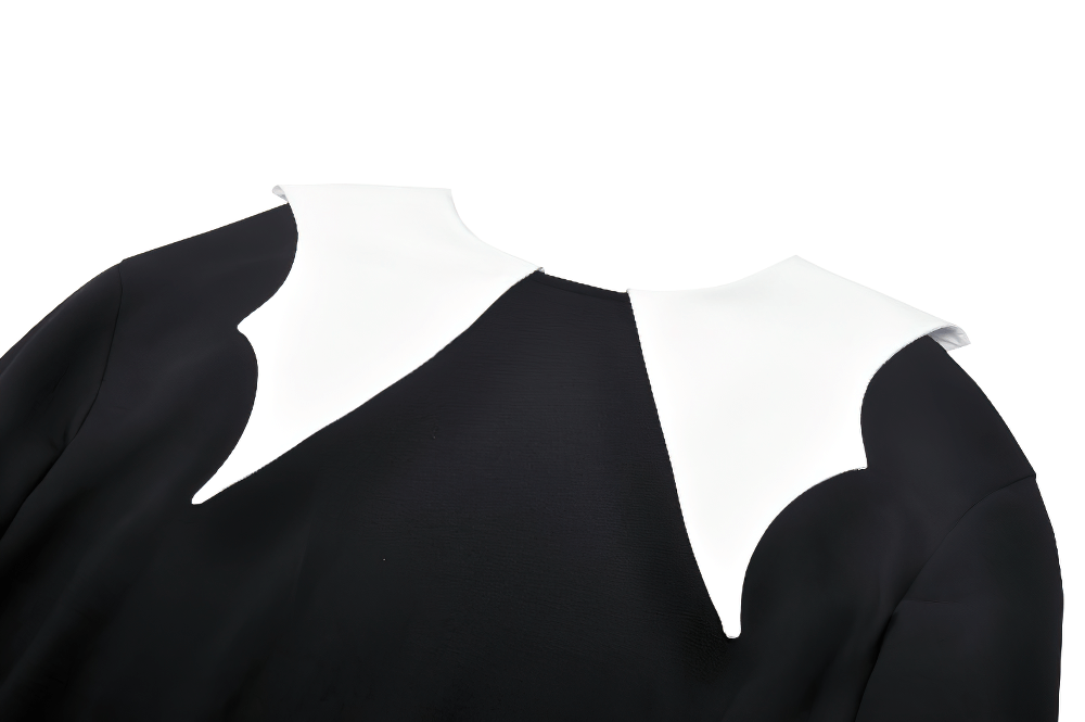 Elegant Peter Pan collar detail on a gothic pullover sweatshirt in black with contrast white accents.