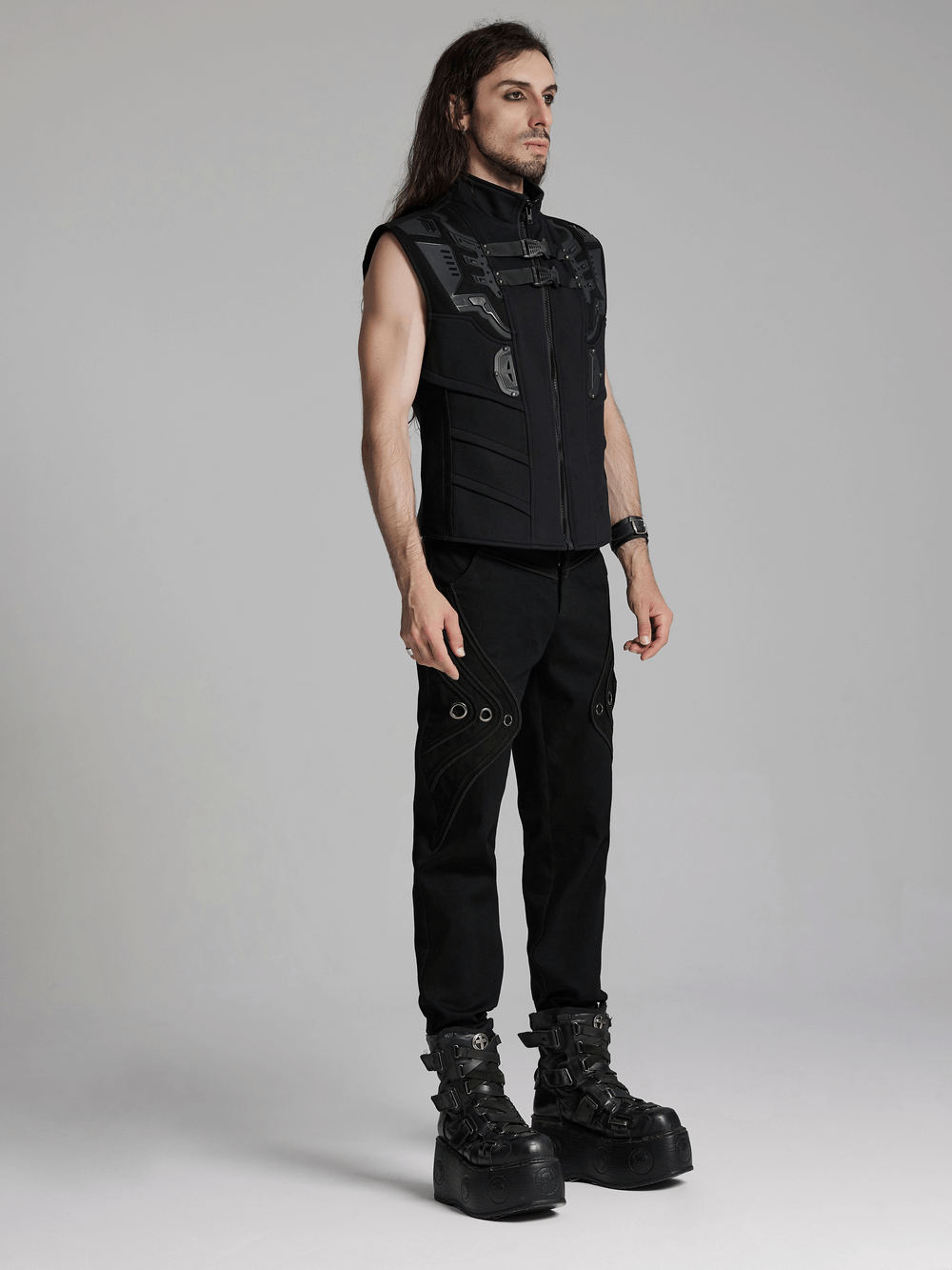 Futuristic cyberpunk vest with rubber armor, paired with stylish black pants and chunky boots, showcasing a bold look.