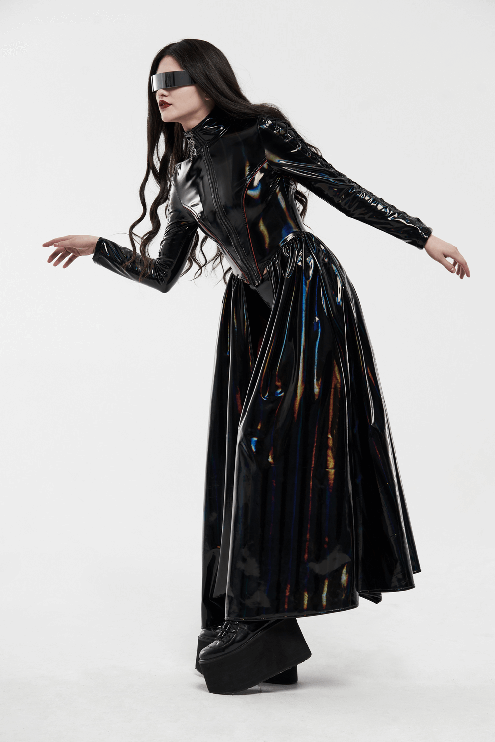 Futuristic high-shine laser-cut long coat for women, featuring sleek design and chic styling in a striking black finish.