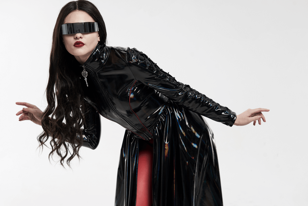 Futuristic high-shine laser-cut long coat for women, featuring a sleek design with unique strap details and stylish visor.